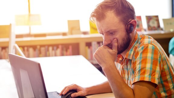 A person at work on his laptop
